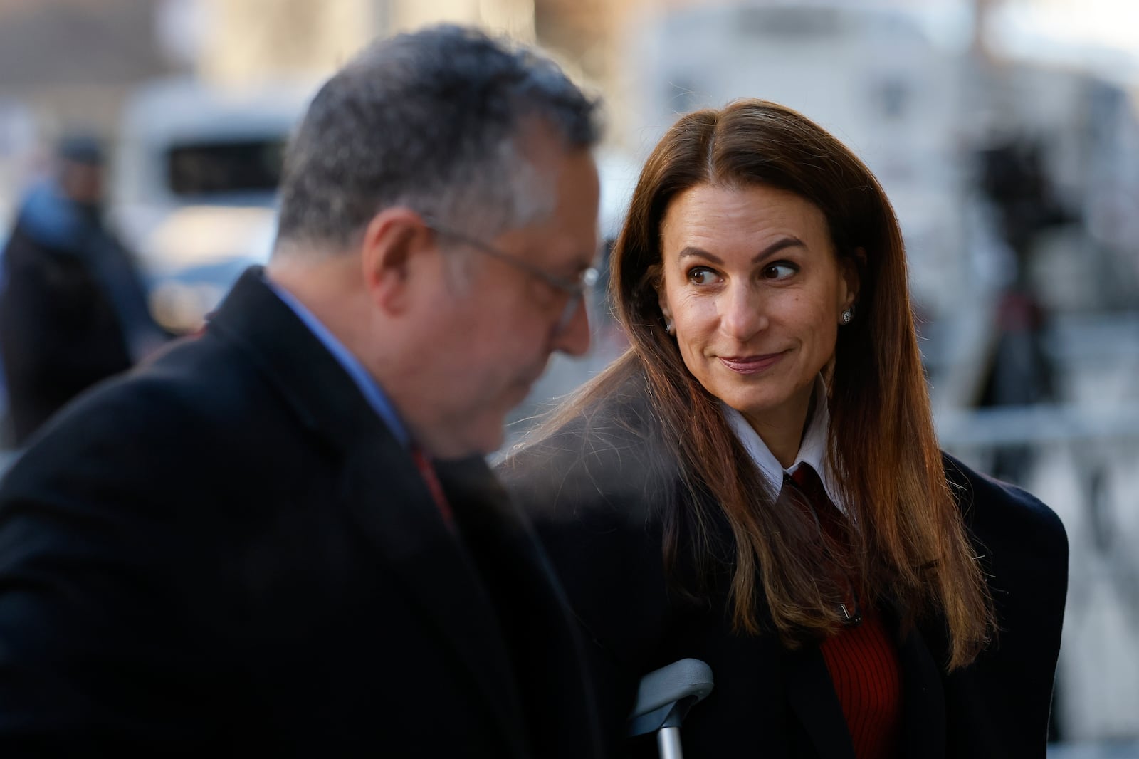 Karen Friedman Agnifilo, right, attorney for Luigi Mangione, arrives at Manhattan Criminal Court, Monday, Dec. 23, 2024, in New York. (AP Photo/Stefan Jeremiah)