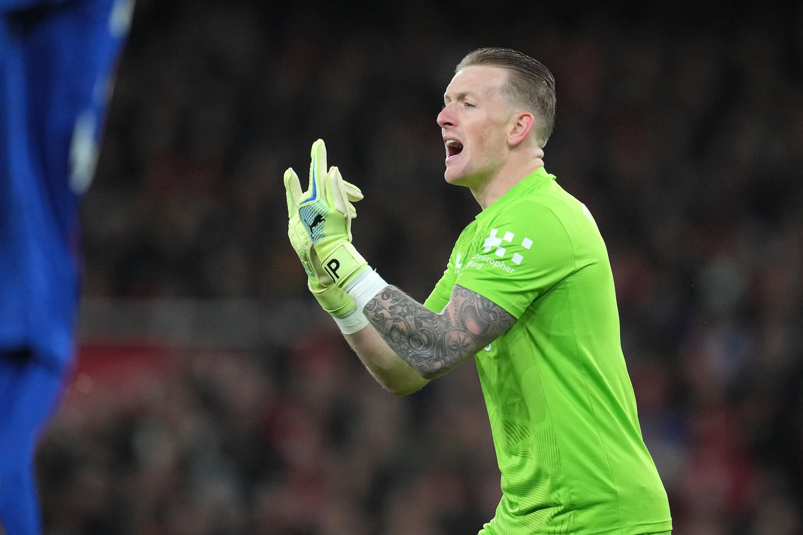 Everton's goalkeeper Jordan Pickford reacts during the English Premier League soccer match between Arsenal and Everton at Emirates Stadium in London, Saturday, Dec. 14, 2024. (AP Photo/Kin Cheung)