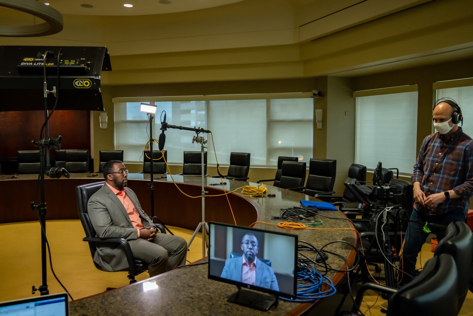 Dr. Andre Harris, president of the Gem City Medical Dental Pharmaceutical Society, participates in a video public service announcement discussing the importance of getting the COVID-19 vaccine. WILL JONES/PREMIER HEALTH