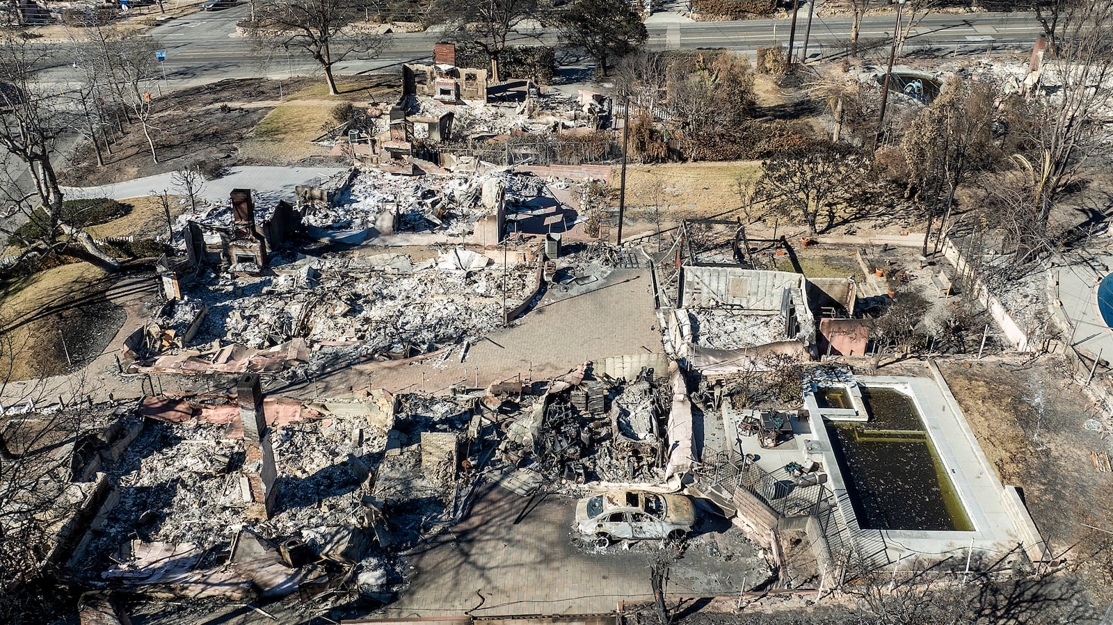 Residences destroyed by the Eaton Fire line a neighborhood in Altadena, Calif., on Tuesday, Jan. 21, 2025. (AP Photo/Noah Berger)