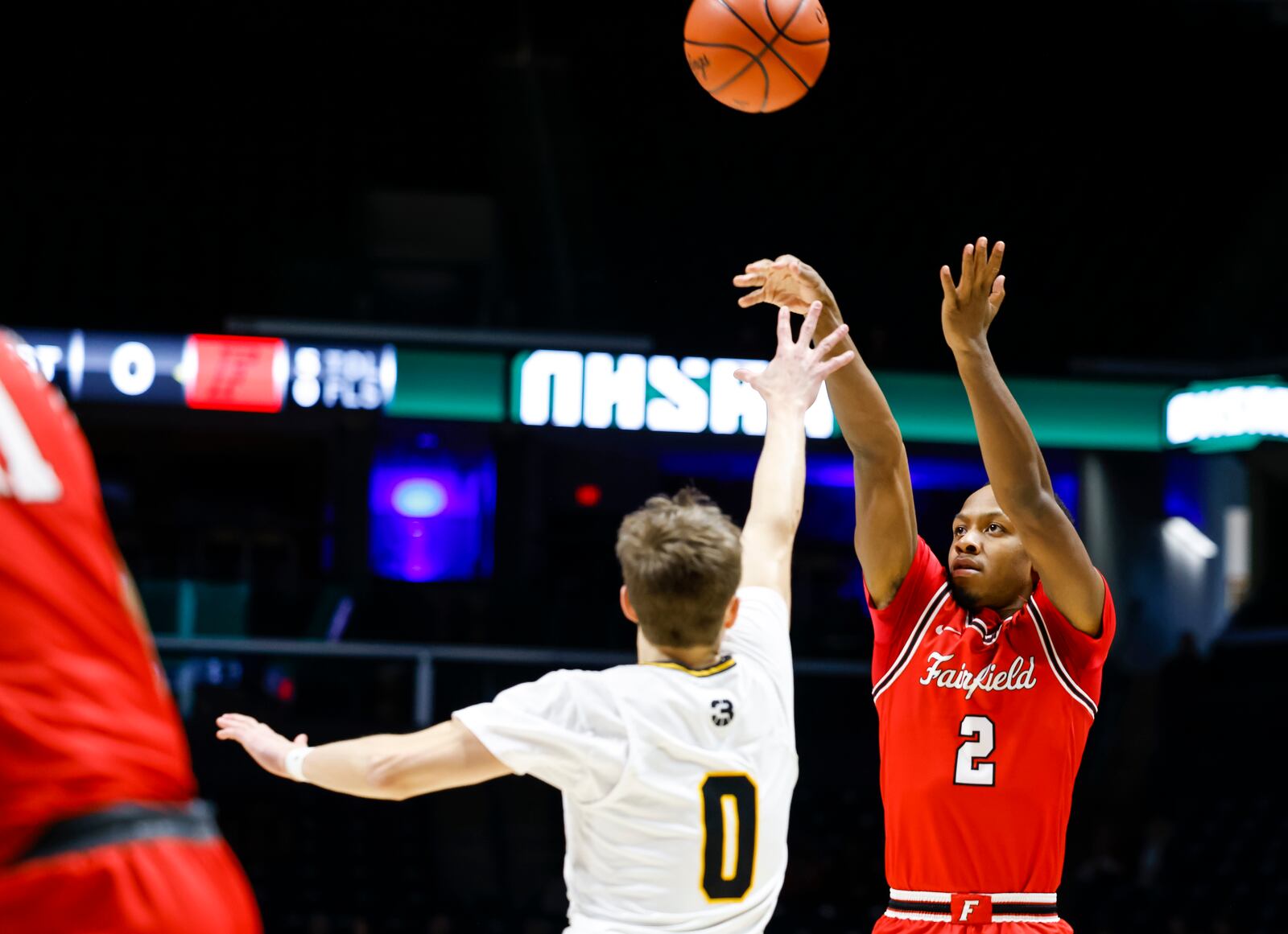 Fairfield's DeShawne Crim puts up a shot defended by Centerville's Gabe Cupps during their Division I regional final basketball game Saturday, March 11, 2023 at Xavier University's Cintas Center. Centerville won 64-53. Crim became Fairfield's all-time leading scorer during the game with a total of 1354 career points. NICK GRAHAM/STAFF