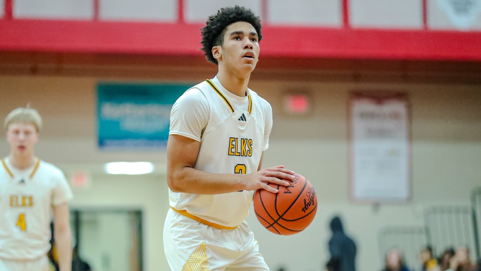 Centerville High School sophomore Trey Sam shoots a free throw during a Division I district semifinal game on Tuesday, Feb. 26, at Trotwood Madison High School. MICHAEL COOPER/STAFF PHOTO