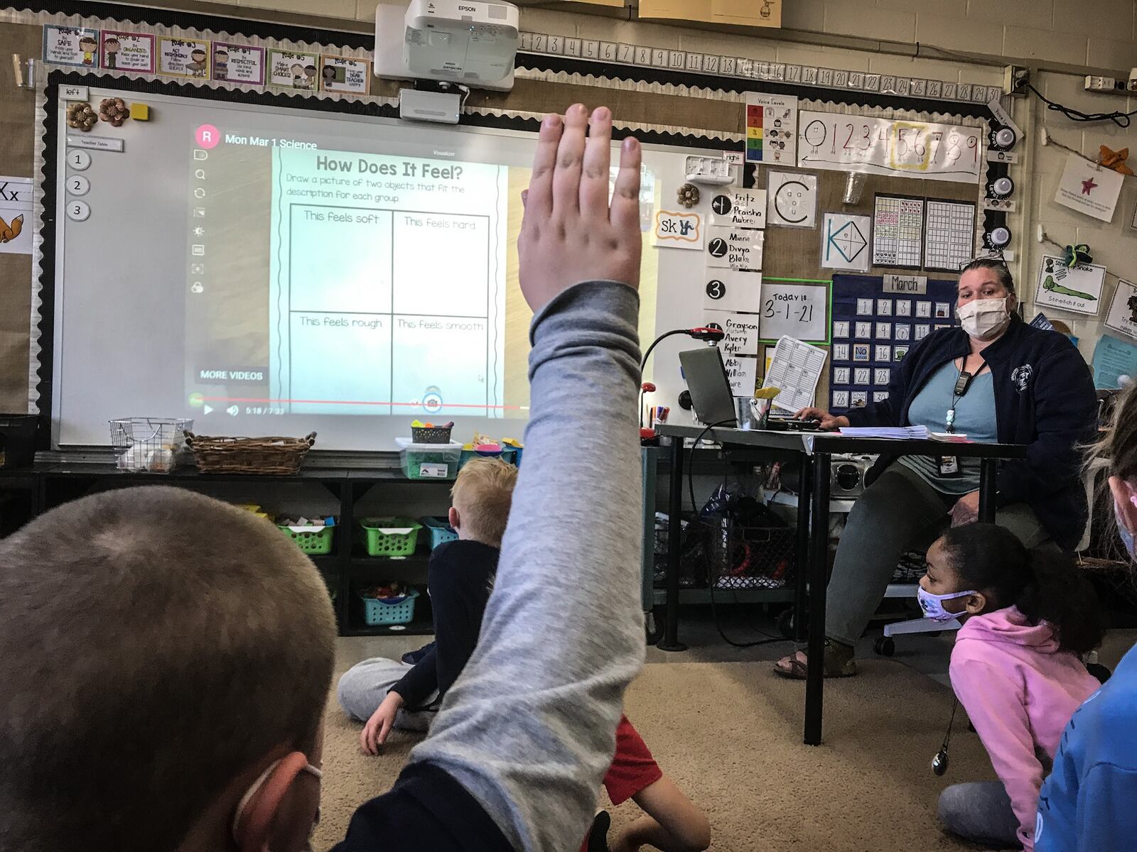 Orchard Park Elementary School first grade teacher answers question from students Tuesday March 2, 2021. The school is now open for in person learning after 12 months of COVID-19 restrictions.