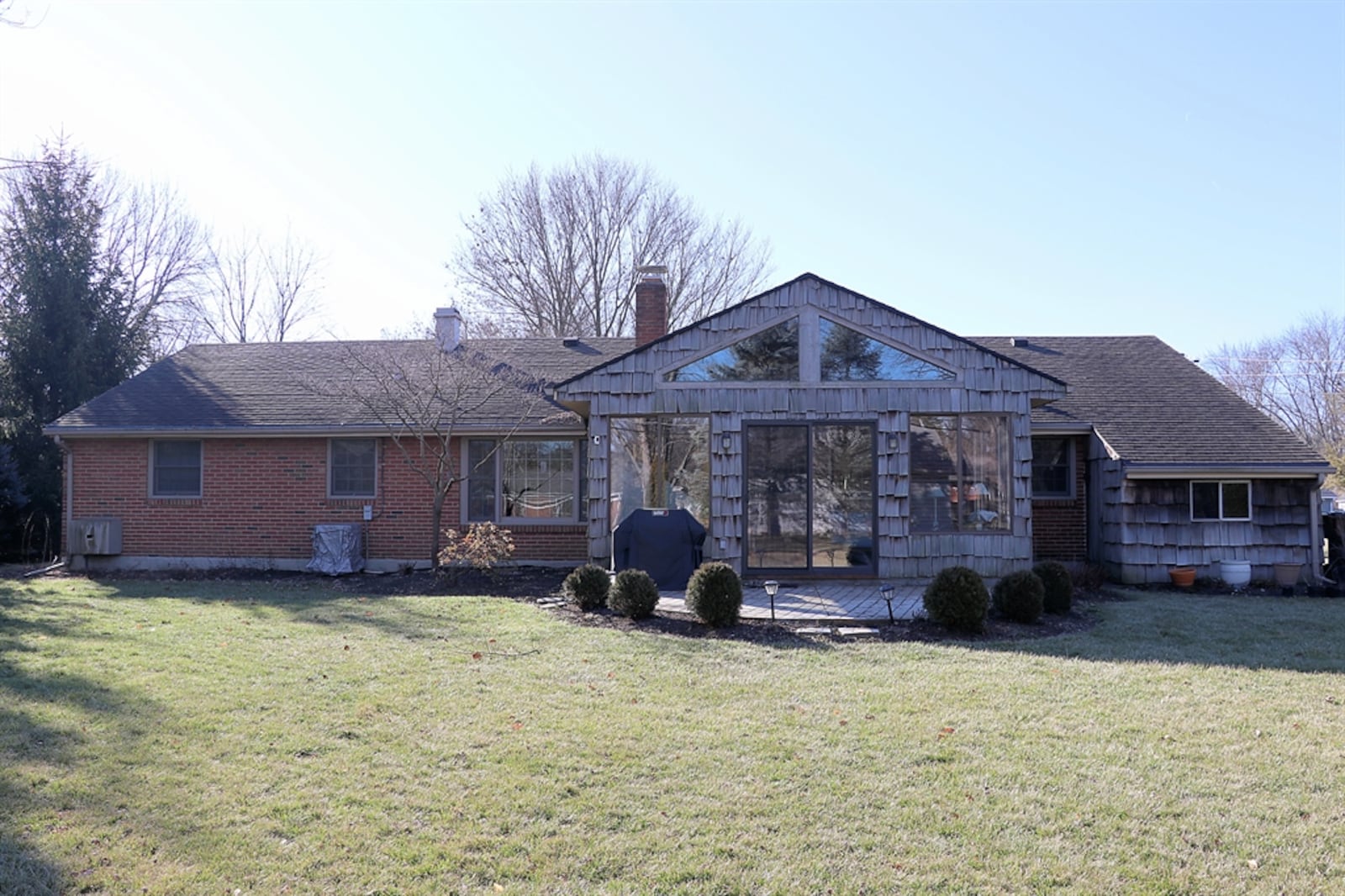 Located in Washington Twp., the near half-acre property has mature trees that surround the open backyard. 