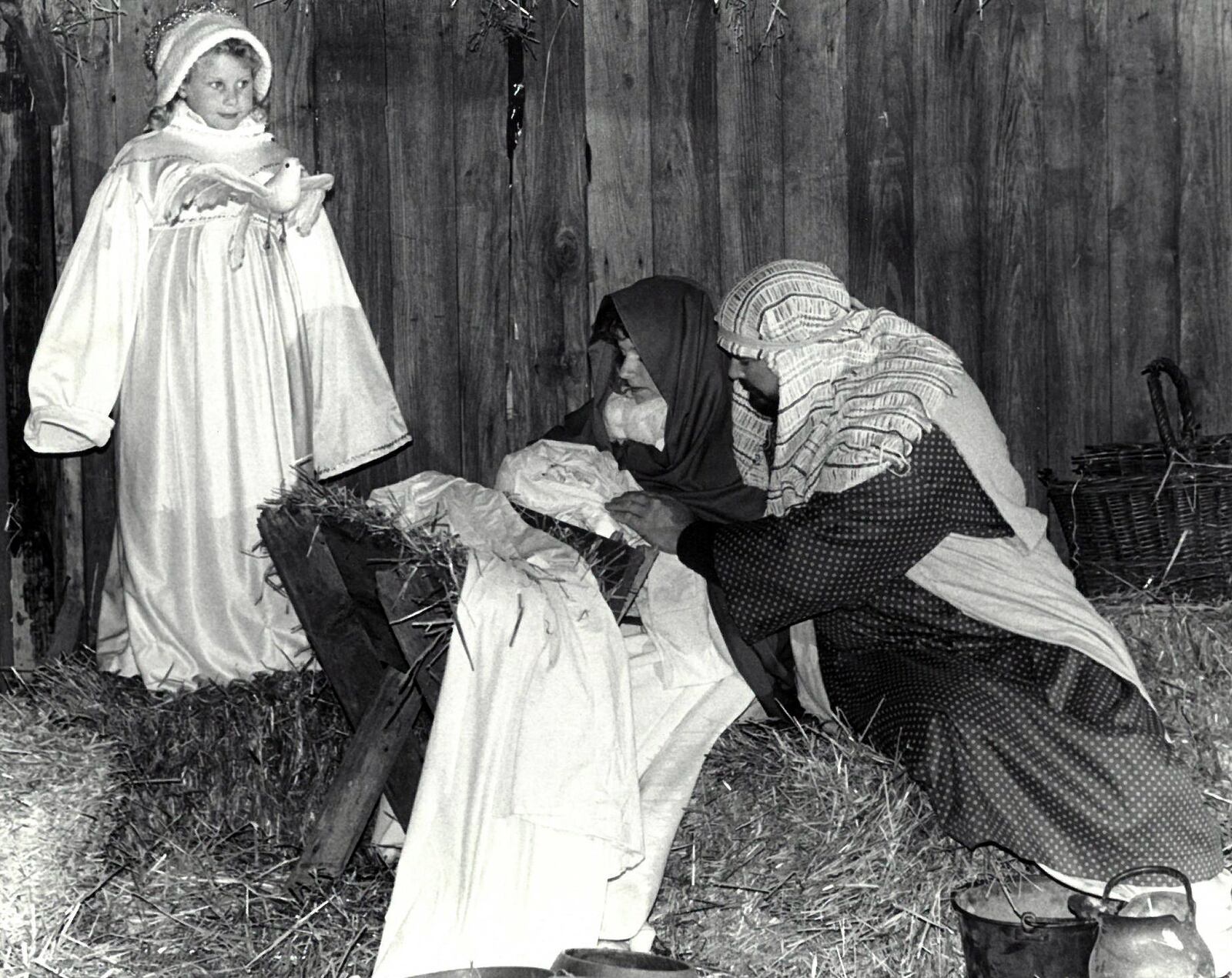 Visiting a live nativity is a tradition for many families. In 1986 Traci Leatherman was an angel, Liesl Roeder was Mary and Richard Harpring was Joseph at One Way Farm in Fairfield. JOURNAL- NEWS ARCHIVE