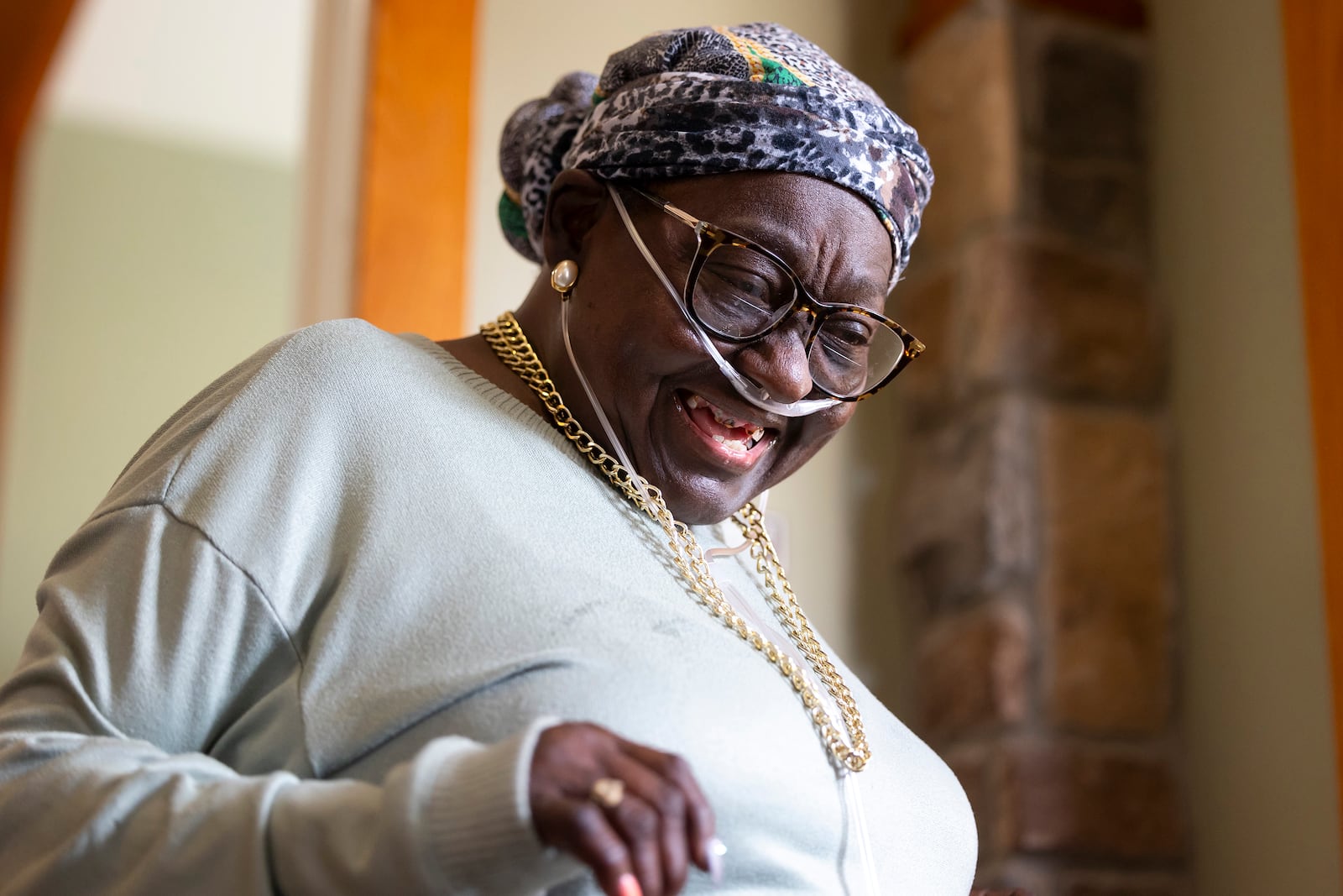 Patricia Johnican smiles as she greets a friend at Commons of Grace Senior on Wednesday, Sept. 25, 2024, in Houston. (AP Photo / Annie Mulligan)