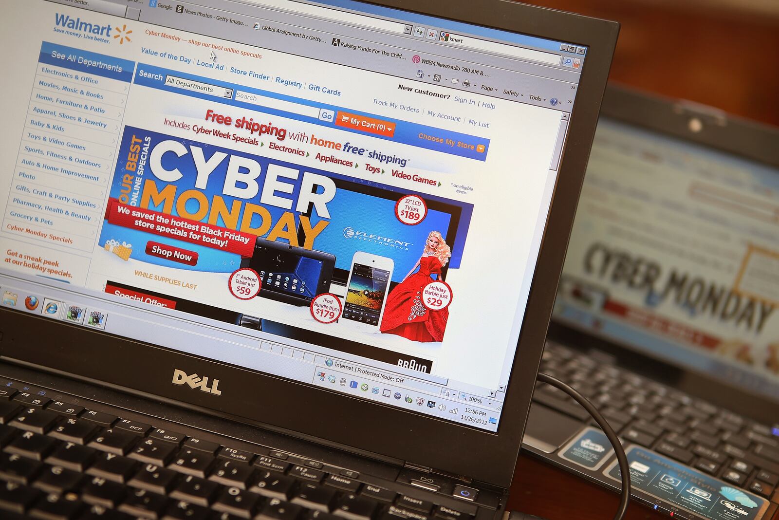 Retailers advertise Cyber Monday deals on their websites on November 26, 2012, in Chicago, Illinois.