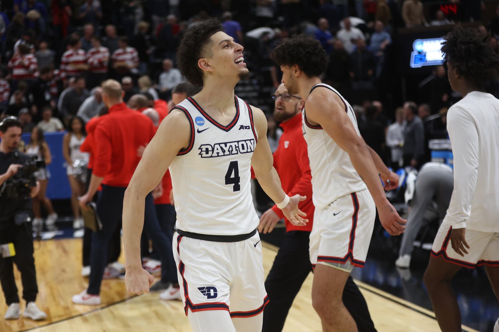 Dayton's Koby Brea celebrates a victory against Nevada in the first round of the NCAA tournament on Thursday, March 21, 2024, at the Delta Center in Salt Lake City, Utah. David Jablonski/Staff