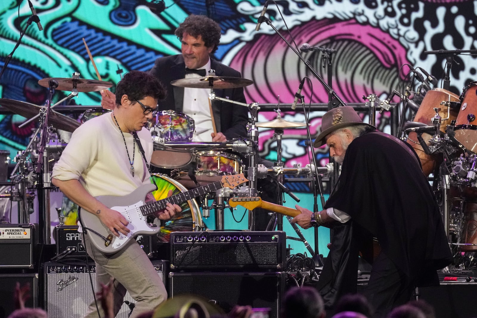 John Mayer, left, and Bobby Weir of 'The Grateful Dead' perform during the MusiCares Person of the Year gala honoring The Grateful Dead on Friday, Jan. 31, 2025, in Los Angeles. (AP Photo/Chris Pizzello)