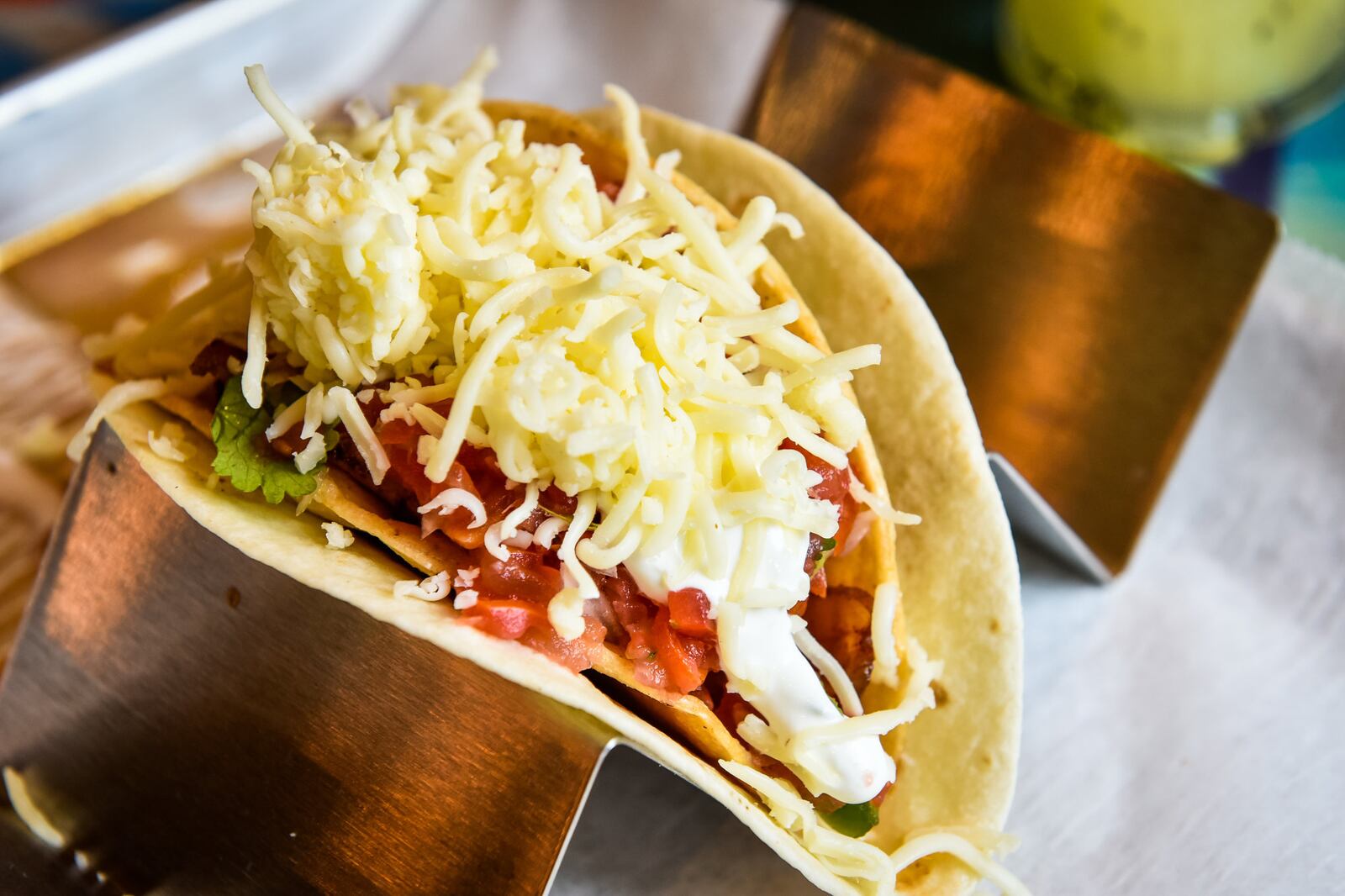 Agave & Rye has opened a location at Liberty Center in Liberty Township. The restaurant features a variety of tacos and large selection of tequilas and bourbons. This is their first location in Ohio. They have locations in Covington and Lexington in Kentucky. This is The Swipe Right taco with honey lime grilled chicken, sweet and spicy bacon, aged white cheddar, salsa and sour cream. NICK GRAHAM/STAFF