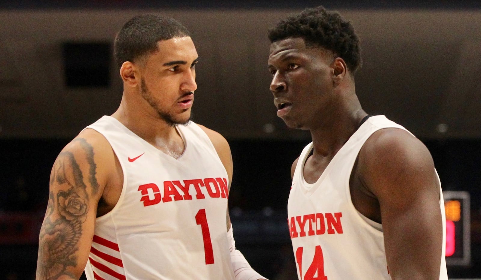 Dayton’s Obi Toppin, left, talks to Moulaye Sissoko during a game against Cedarville on Saturday, Nov. 2, 2019, at UD Arena.