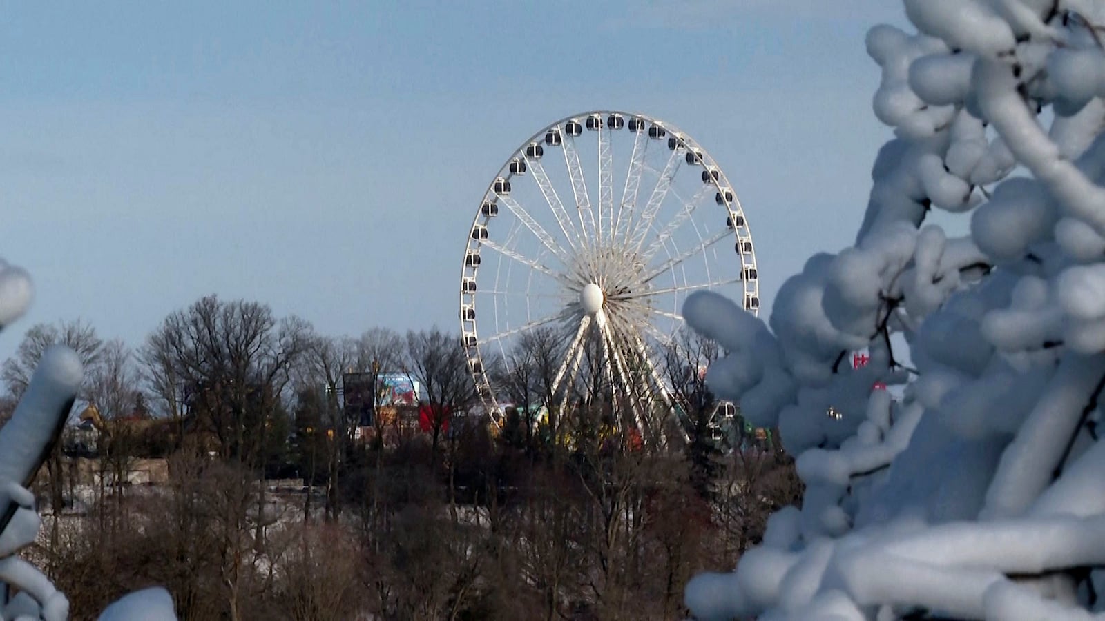 The Niagara SkyWheel is seen in the distance with snow and ice in the foreground Wednesday, Feb. 12, 2025, in Niagara Falls, N.Y. (AP Photo/Mike Householder)