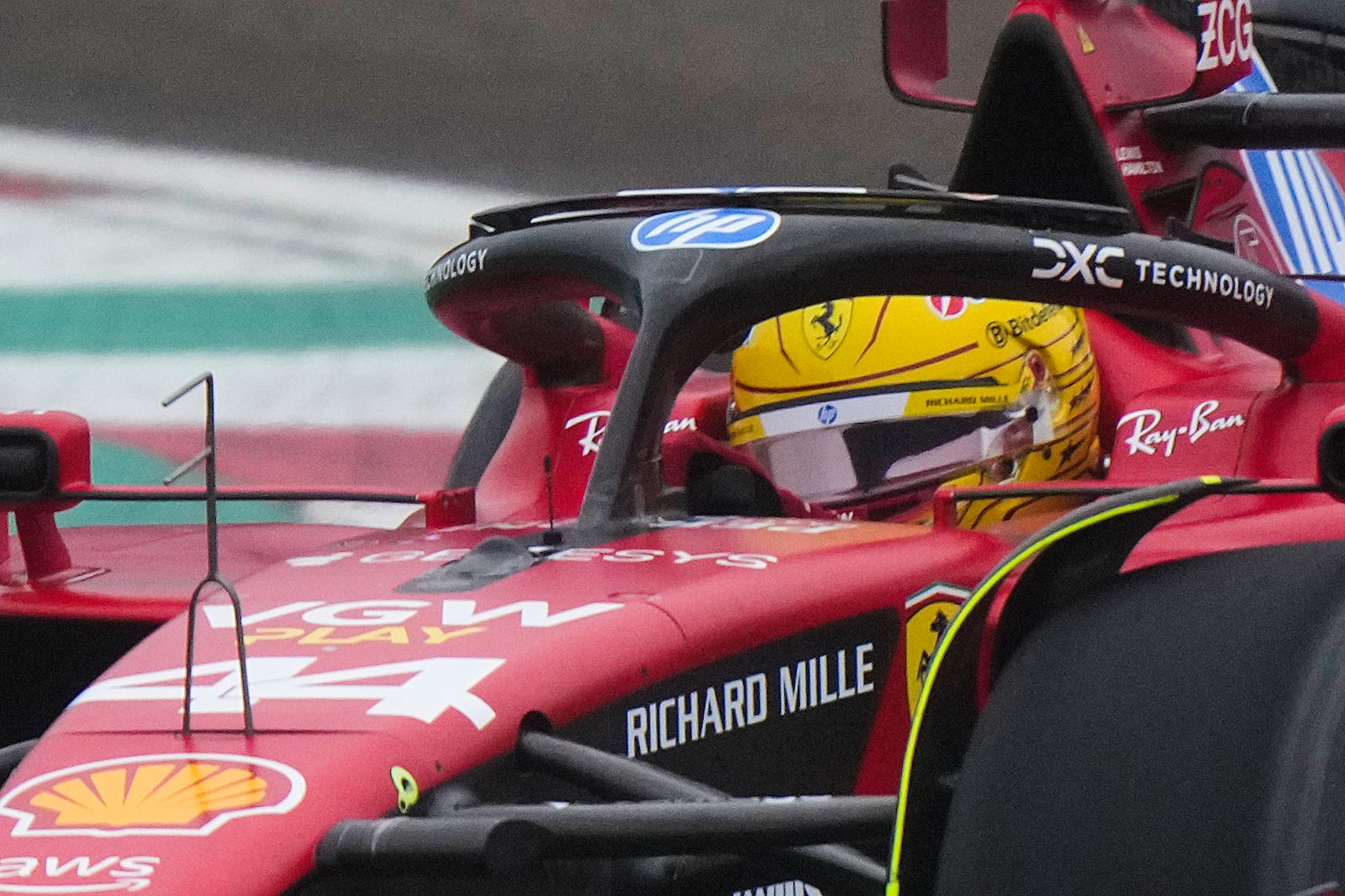 British driver Lewis Hamilton steers a Ferrari Formula One SF-23 at the Ferrari private test track, in Fiorano Modenese, Italy, Wednesday, Jan.22, 2025. (AP Photo/Luca Bruno)