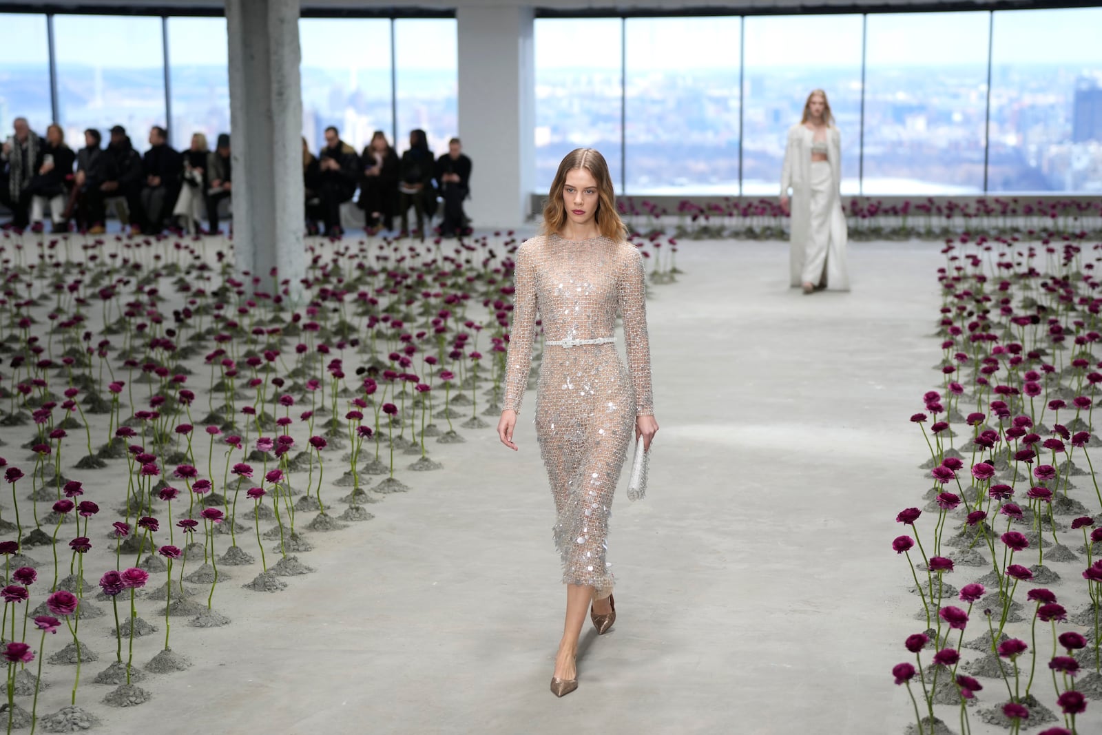 Models walk the runway during the Carolina Herrera Fall/Winter 2025 fashion show as part of New York Fashion Week on Monday, Feb. 10, 2025, in New York. (Photo by Charles Sykes/Invision/AP)