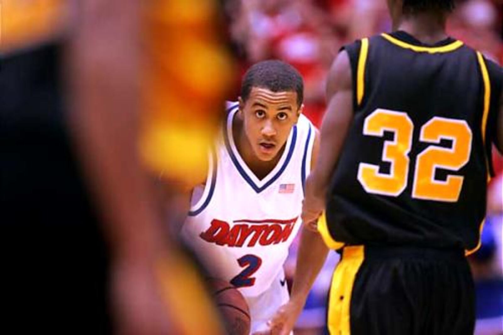 Brian Roberts looks for an open teammate to pass to as they run out the clock late in the game. Dayton hosted and defeated Grambling by a score of 58-49.