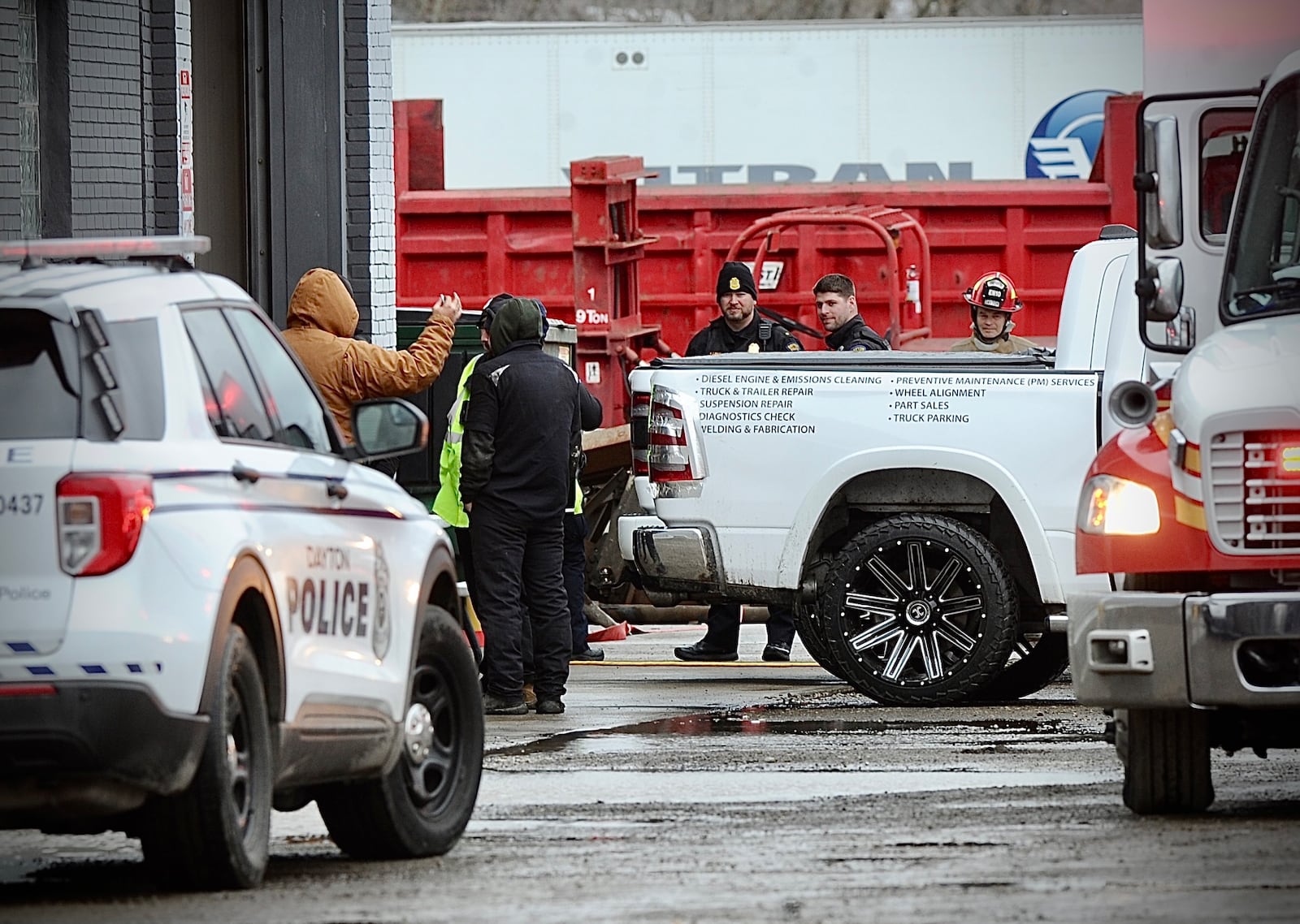 The Dayton Fire Department, a hazmat team and Dayton police responded to an incident Wednesday, Jan. 25, 2023, at ENS Truck Repair Eagle Trucking in the 1100 block of West Stewart Street. MARSHALL GORBY \STAFF