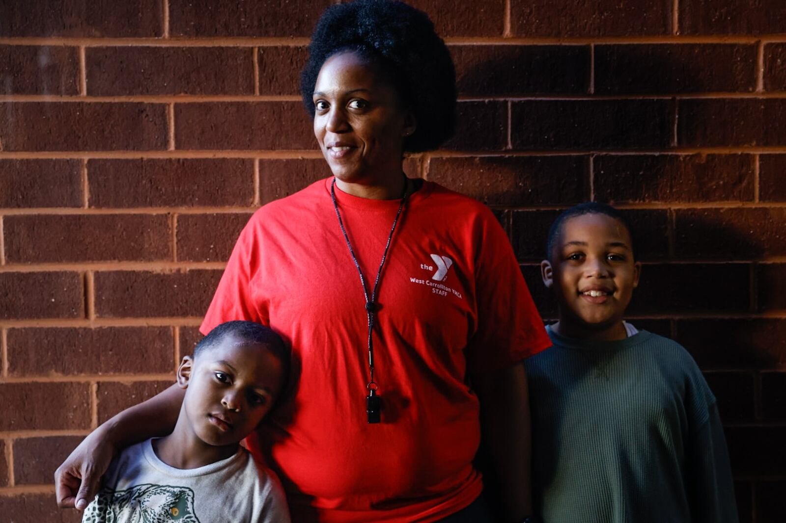 Ashley Brown and her two sons, Dominic, left, and Leonne survived a horrific accident, and with the help of Premier Health and Dayton Children's, the family are back on their feet. JIM NOELKER/STAFF