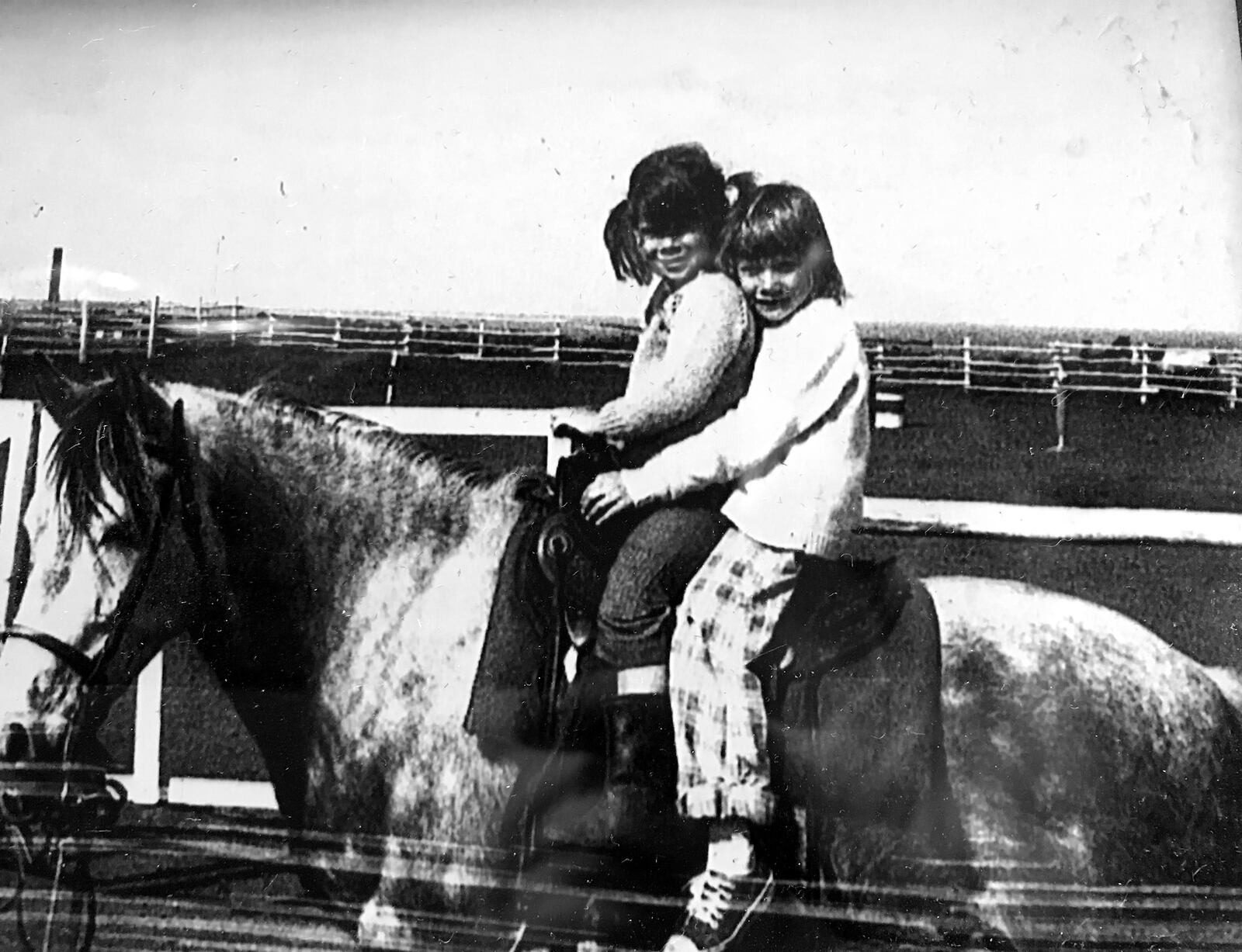 Rodgers (L) and her lifelong friend, Ellen Henderson, sitting atop Rodger's horse while they pair lived in the Azores Islands in 1975.