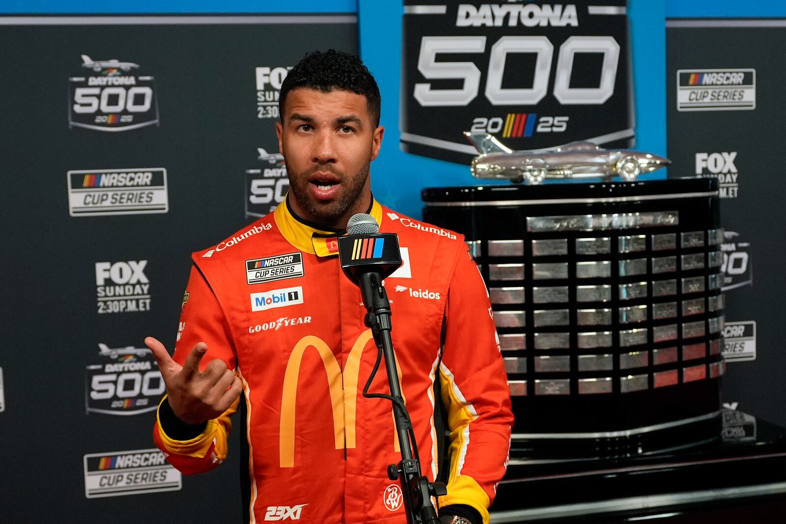 Bubba Wallace talks with reporters during media day at the NASCAR Daytona 500 auto race, Wednesday, Feb. 12, 2025, at Daytona International Speedway in Daytona Beach, Fla. (AP Photo/John Raoux)