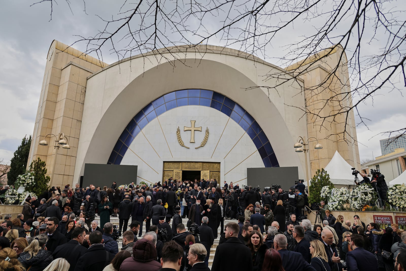 People gather during the funeral of the late Archbishop Anastasios of Tirana, Durres and All Albania, at the Cathedral of the Resurrection of Christ, in Tirana, Albania, Thursday, Jan. 30, 2025. (AP Photo/Vlasov Sulaj)