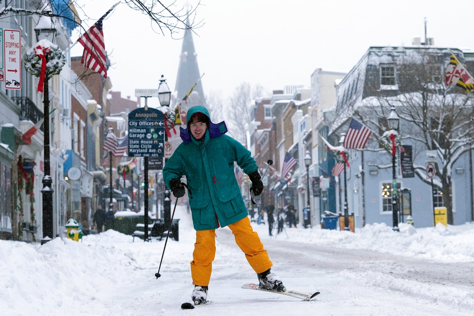 FILE - Cosimos Cendo, of Washington, D.C., skis down Main Street in Annapolis, Md., Jan. 6, 2025, during a snow storm. (AP Photo/Susan Walsh, File)