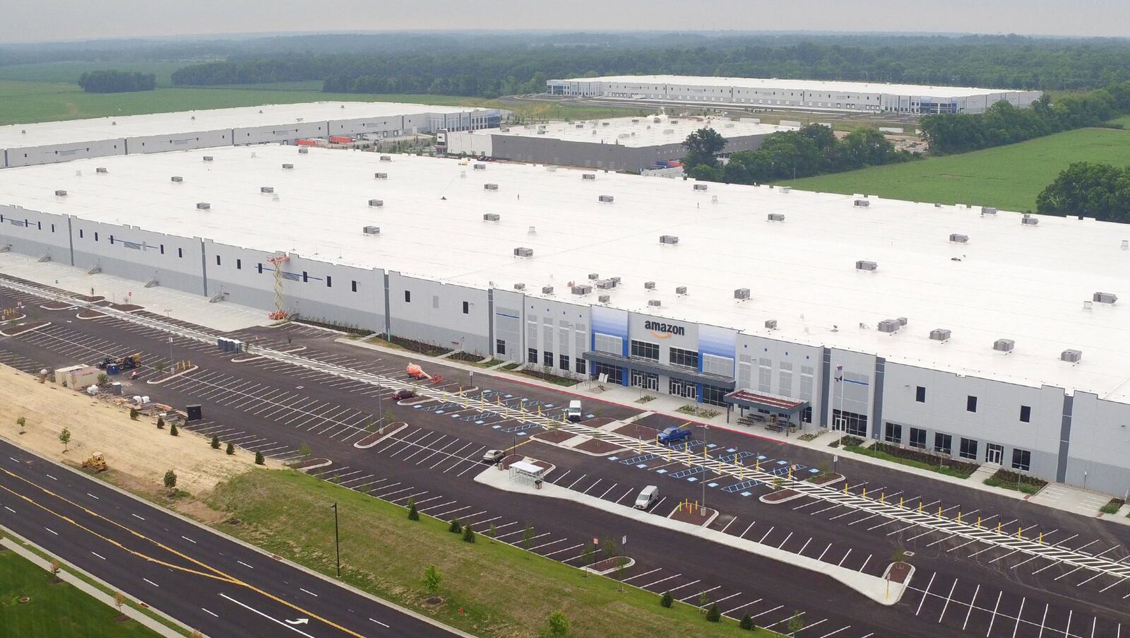 Giant warehouses cover Park North in Monroe where Amazon recently built a million-square-foot distribution center. TY GREENLEES / STAFF