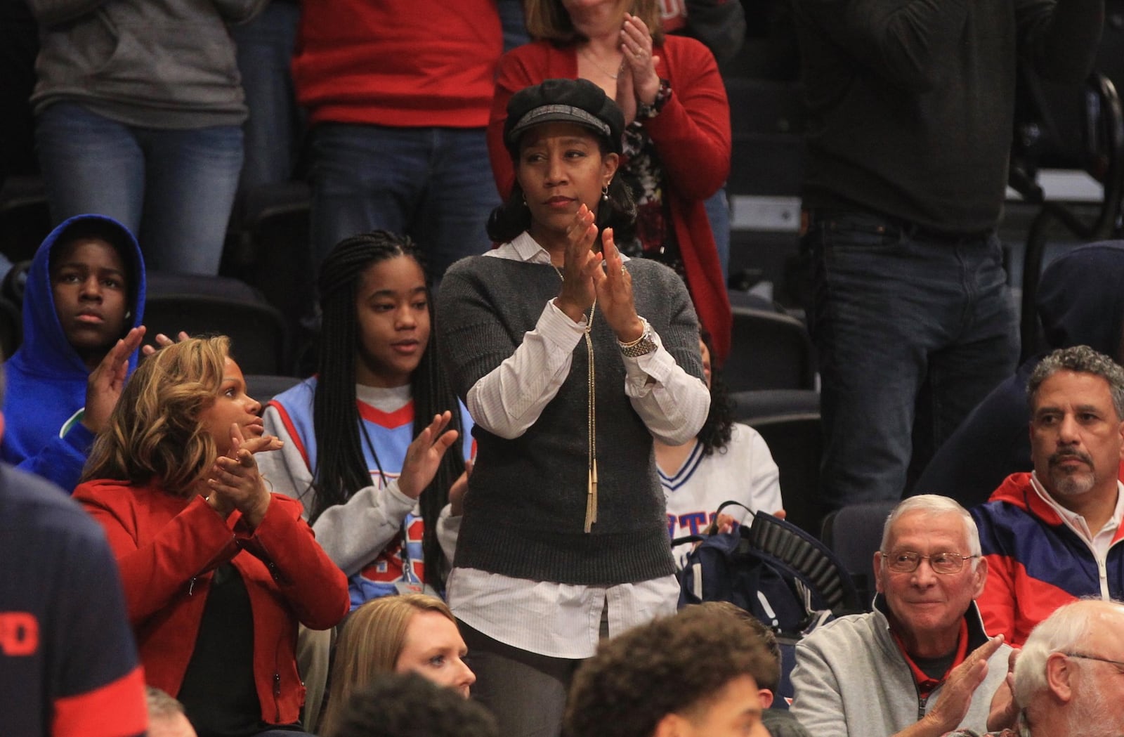 Chris Grant, wife of Dayton coach Anthony Grant, claps during a game against Rhode Island on Tuesday, Feb. 11, 2020, at UD Arena. David Jablonski/Staff