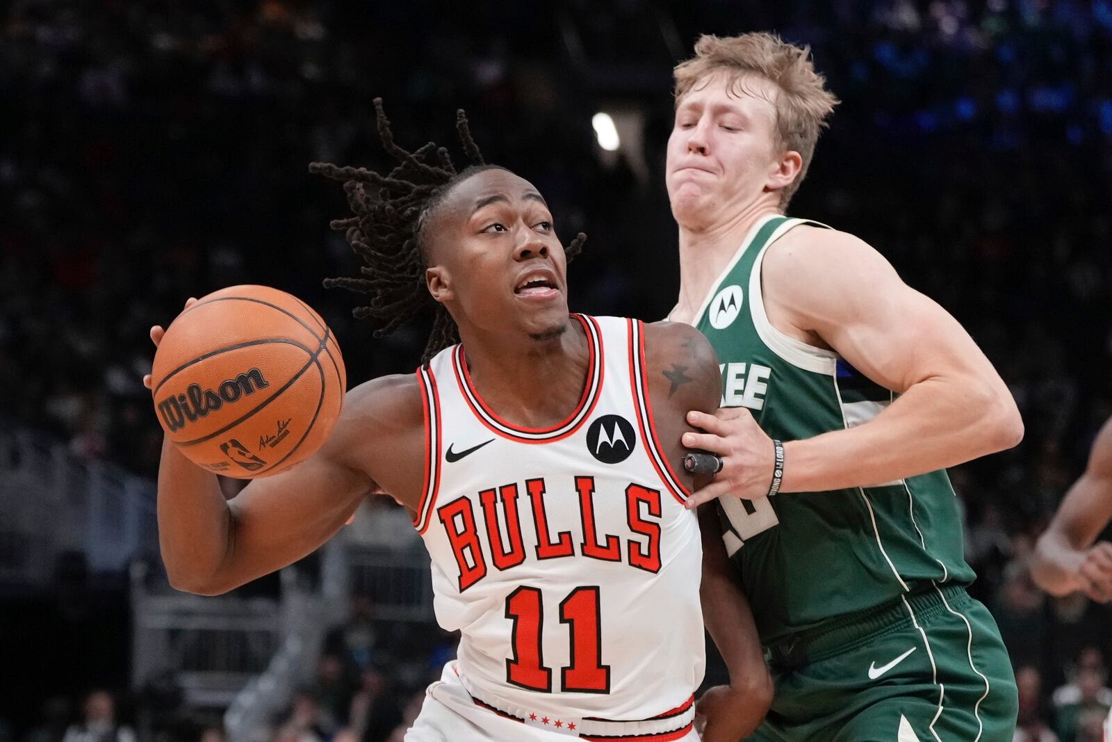 Chicago Bulls' Ayo Dosunmu tries to get by Milwaukee Bucks' AJ Green during the first half of an NBA basketball game Wednesday, Nov. 20, 2024, in Milwaukee. (AP Photo/Morry Gash)