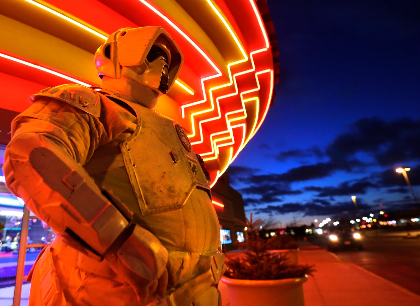 A Star Wars character with the 501st Legion Wisconsin Garrison waits for fans during the opening of Star Wars: The Force Awakens at Marcus Theaters Appleton East Cinema Thursday, Dec. 17, 2015, in Appleton, Wis. (Wm. Glasheen/The Post-Crescent via AP)