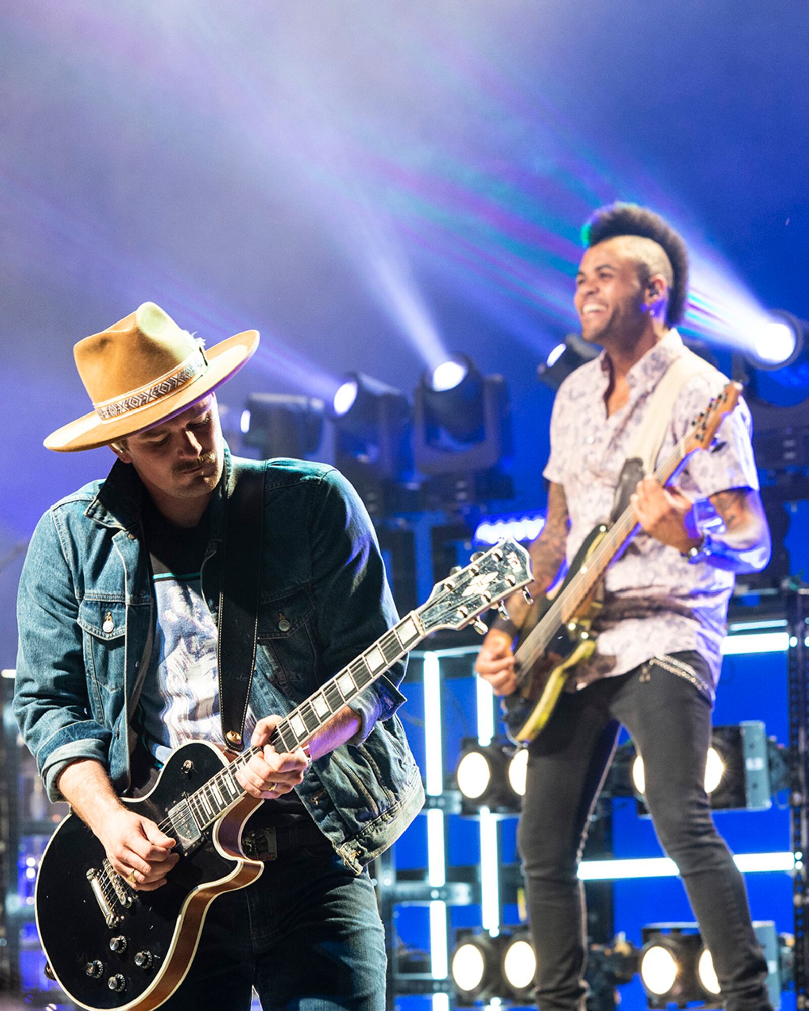 Guitarist Derrick Royer (left) and bass player John Souki perform during a Chase Rice concert Aug. 11 at Fraze Pavilion in Kettering. U.S. AIR FORCE PHOTO/JAIMA FOGG