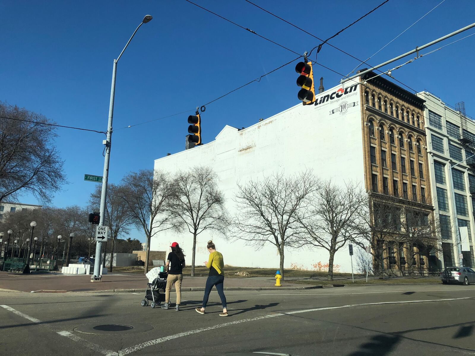 Developer Crawford Hoying says it plans to construct a new apartment building called the Sutton on vacant land next to the Lincoln Storage building, near the Day Air Ballpark, where the Dayton Dragons play. CORNELIUS FROLIK / STAFF