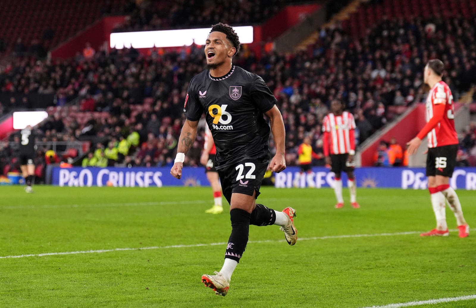 Burnley's Marcus Edwards celebrates scoring during the English FA Cup fourth round soccer match between Southampton and Burnley at St Mary's Stadium, Southampton, England, Saturday Feb. 8, 2025. (John Walton/PA via AP)