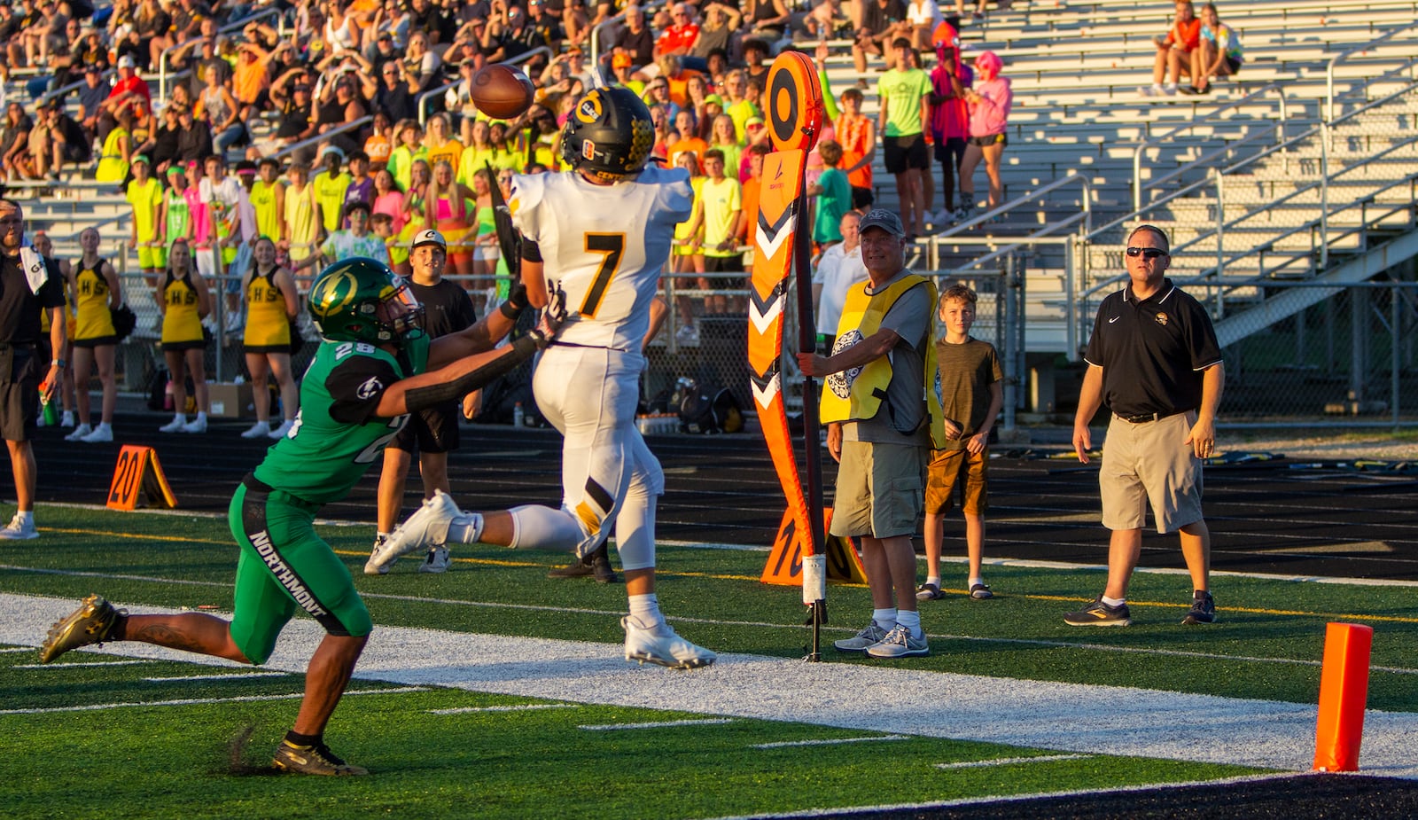 Centerville's Nic Bruder reaches for a 19-yard touchdown catch from Chase Harrison in front of Northmont's Jason Ashe for the Elks' first score Friday night at Northmont. Jeff Gilbert/CONTRIBUTED