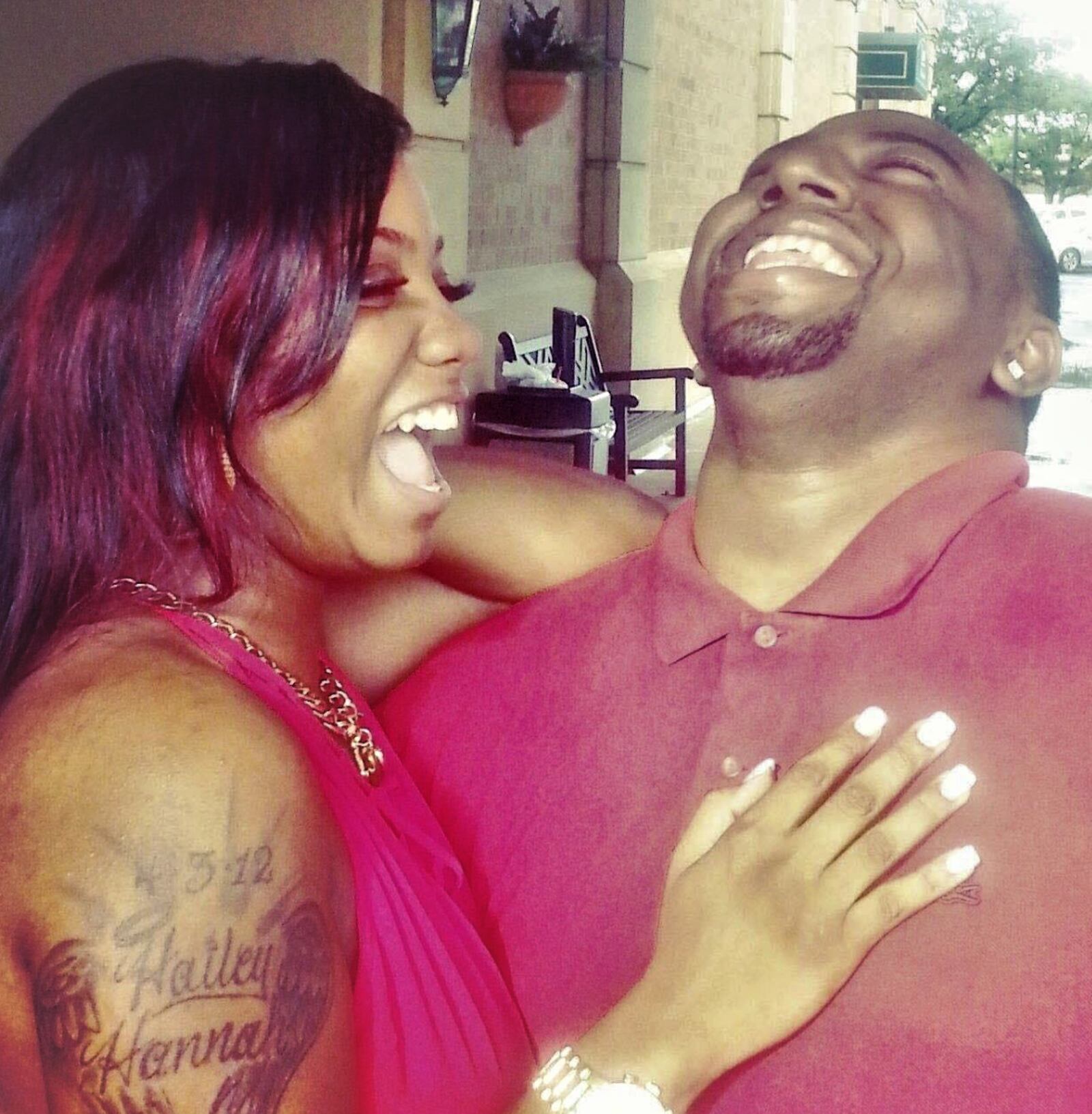 Lois Oglesby and boyfriend Darryl Lee enjoy a laugh during a Jay-Z and Beyonce concert in 2015./CONTRIBUTED