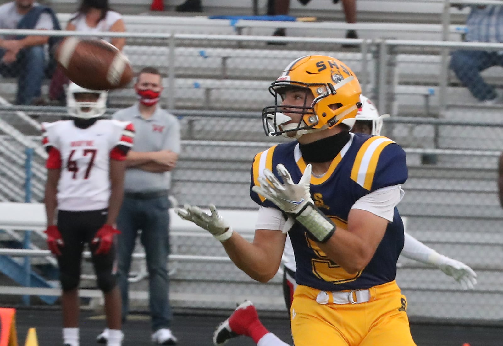 Springfield's Ben Van Noord catches a pass for a touchdown against Wayne Friday night. BILL LACKEY/STAFF