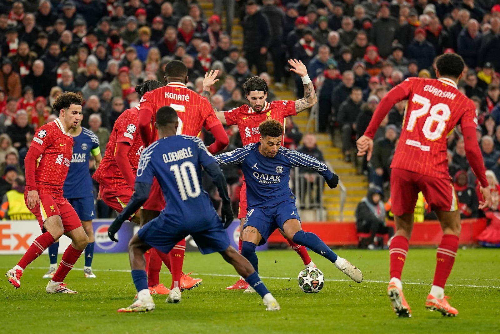 PSG's Desire Doue goes close with a shot during the Champions League round of 16 second leg soccer match between Liverpool and Paris Saint-Germain at Anfield in Liverpool, England, Tuesday, March 11, 2025. (AP Photo/Dave Thompson)