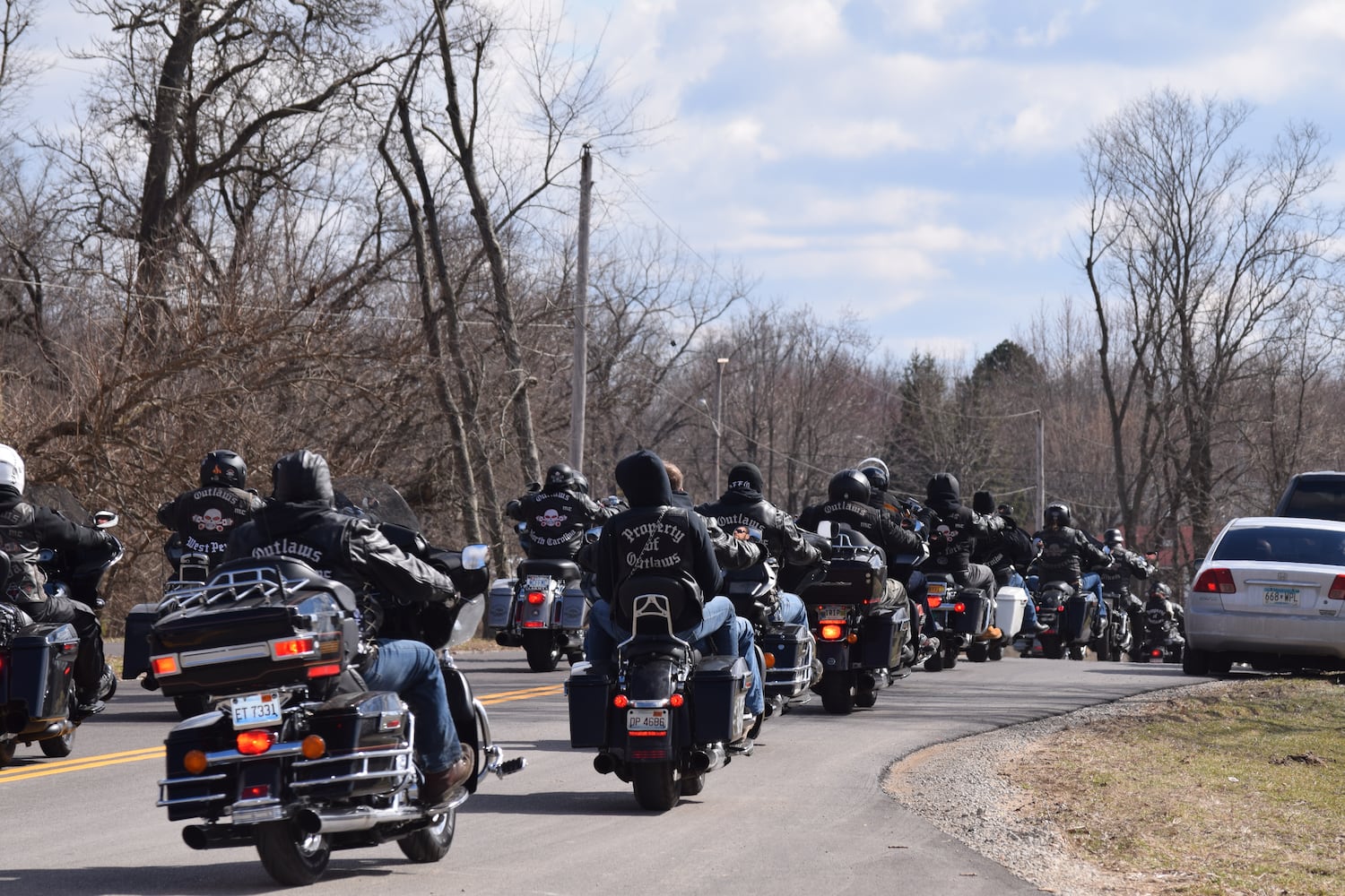 PHOTOS: Thousands of Outlaws attend motorcycle gang leaders funeral at Montgomery County Fairgrounds.