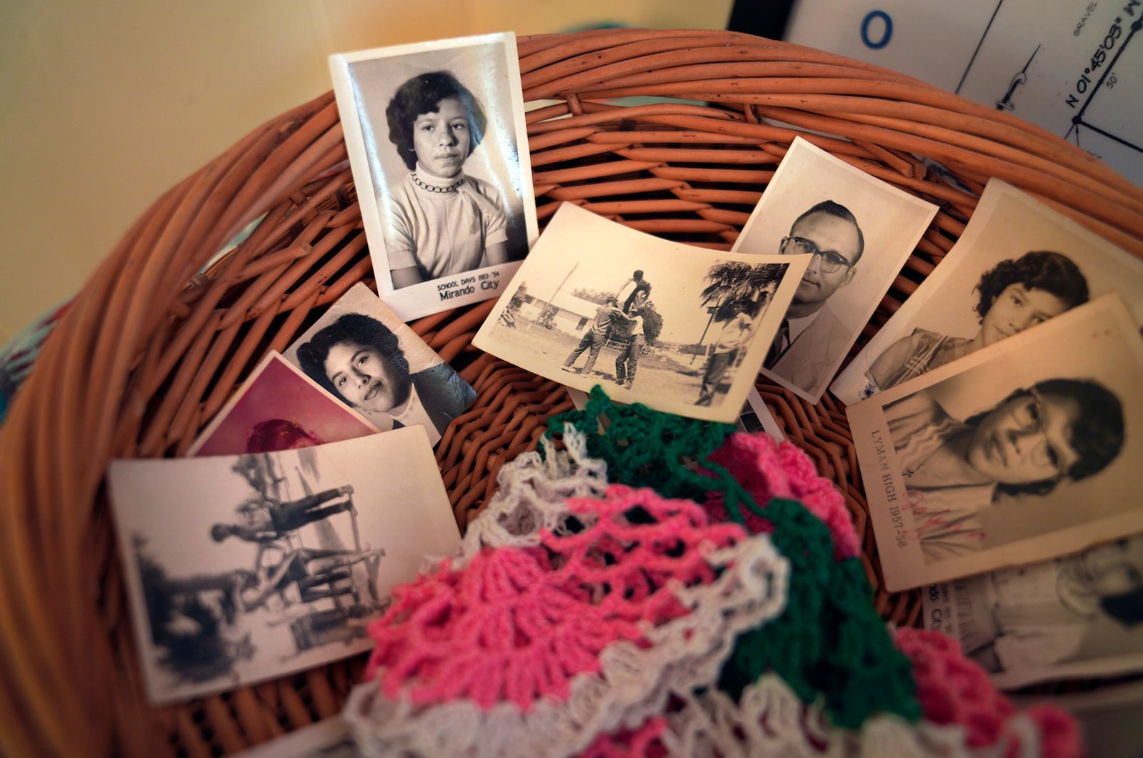 Photos of the late Amada Cardenas, who was one of the first federally licensed peyote dealers, alongside her husband, to harvest and sell the sacramental plant to followers of the Native American Church, in Mirando City, Texas, Monday, March 25, 2024. (AP Photo/Jessie Wardarski)