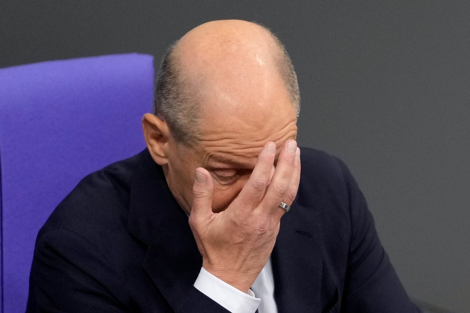 German Chancellor Olaf Scholz attends a plenary session in the German parliament Bundestag in Berlin, Germany, Wednesday, Nov. 13, 2024. (AP Photo/Markus Schreiber)