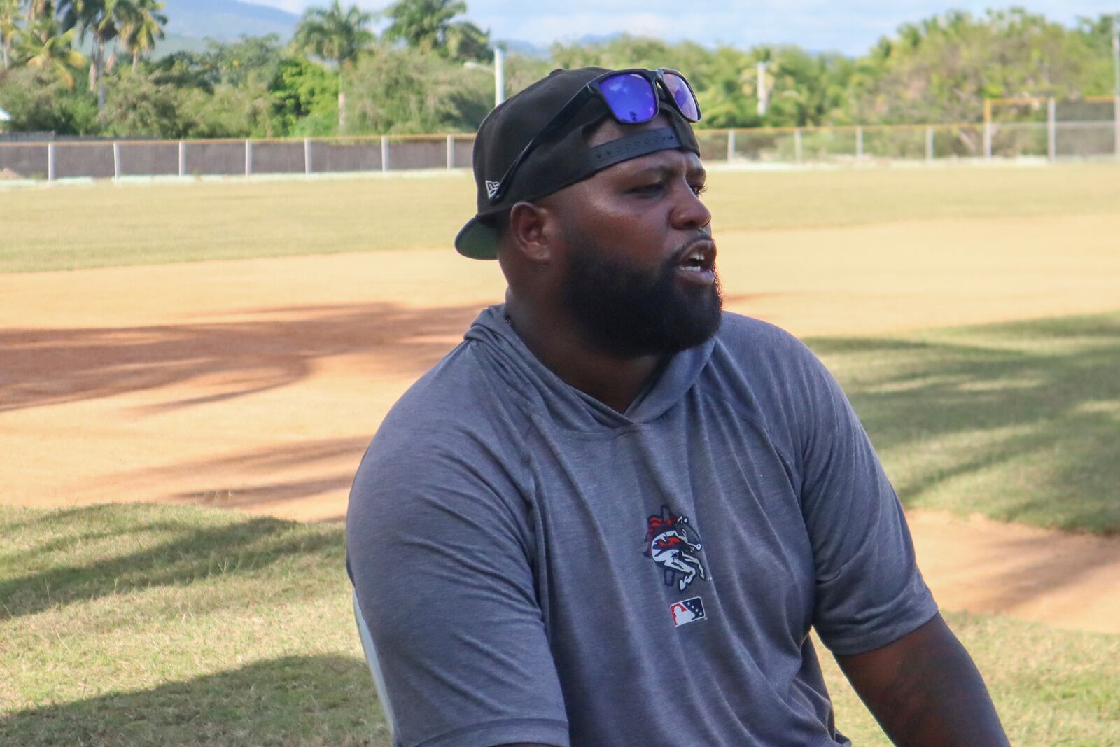 Carlos Alvarez, formerly known as Esmailyn “Smiley” González, who lied about his age to play for the Washington Nationals in 2006, speaks during an interview in Pizarrete, Dominican Republic, Tuesday, Jan. 28, 2025. (AP Photo/Martin Adames)