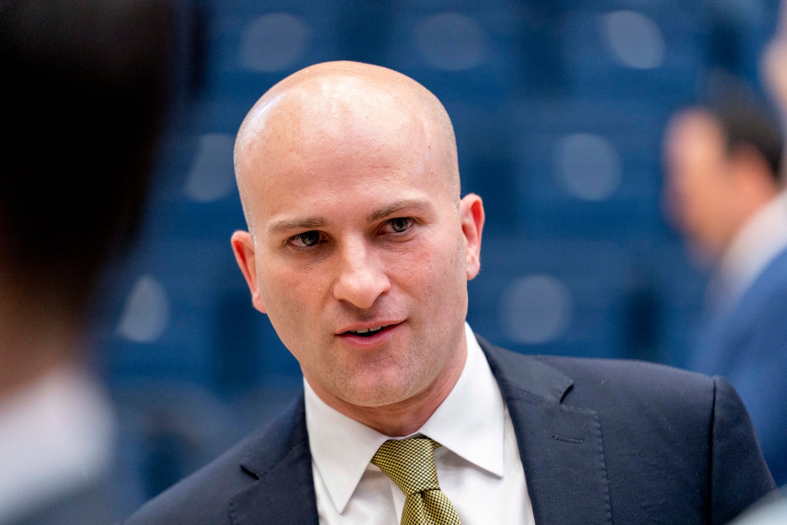 Chris Caputo speaks at a news conference at the Charles E. Smith Center in Washington, D.C., Monday, April 11, 2022, after being named the new mens basketball head coach for George Washington University. (AP Photo/Andrew Harnik)