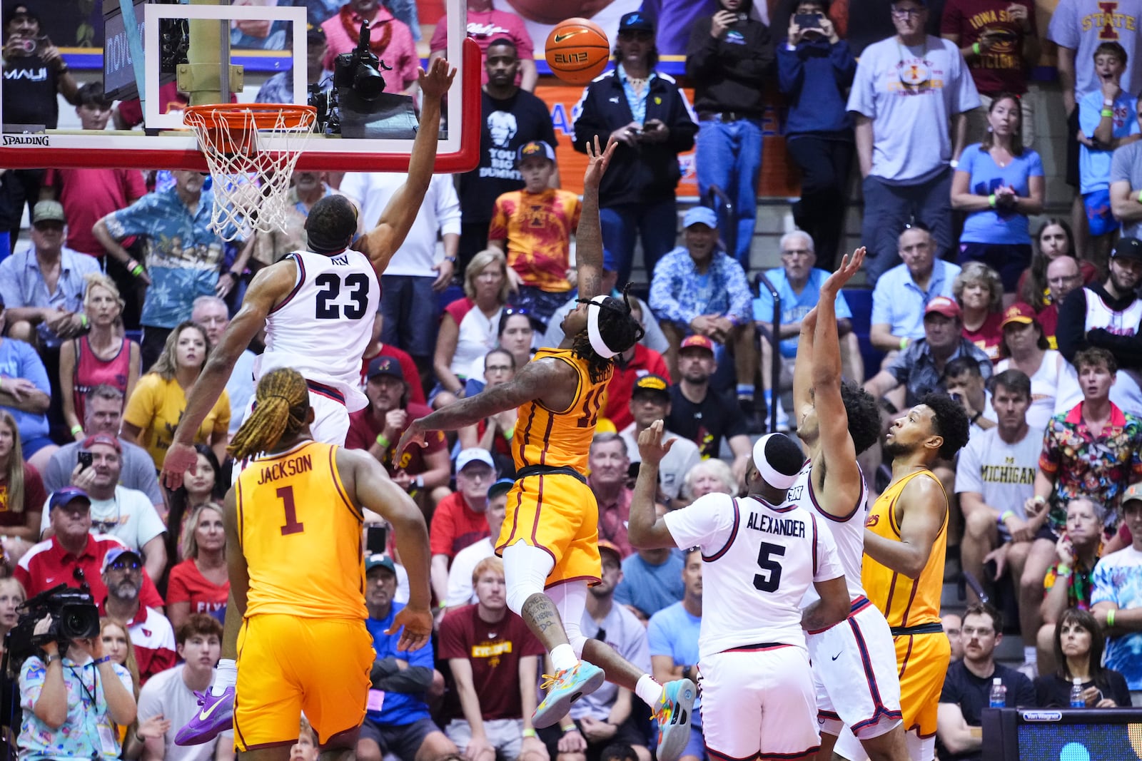 Iowa State guard Keshon Gilbert scores against Dayton forward Zed Key (23) during the second half of an NCAA college basketball game at the Maui Invitational Tuesday, Nov. 26, 2024, in Lahaina, Hawaii. Iowa State won 89-84. (AP Photo/Lindsey Wasson)