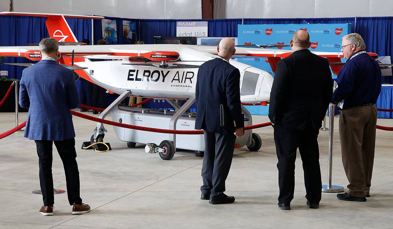 Guests at the National Advanced Air Mobility Forum look over a UAV from the ELROY Air company Monday, Sept. 18, 2023. BILL LACKEY/STAFF