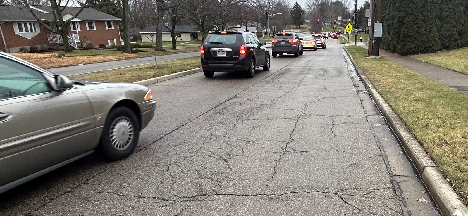 When water gets under the surface of cracked pavement, then goes through the freeze-thaw cycle, it expands and contracts, creating the potential for potholes. JEREMY P. KELLEY / STAFF