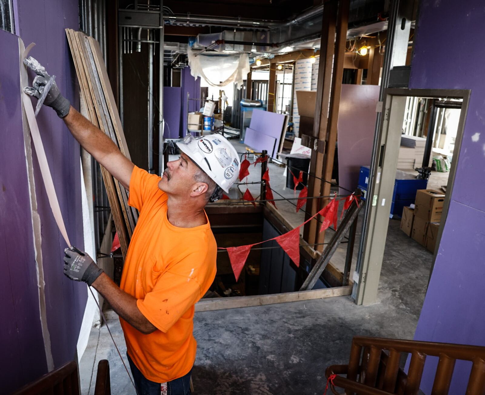 Drywall finisher, Steve Geisel works on the inside of the Great Council State Park Interpretive Center on US 68 just north of Xenia. The area is thought to be the largest-known Shawnee settlement in Ohio. JIM NOELKER/STAFF