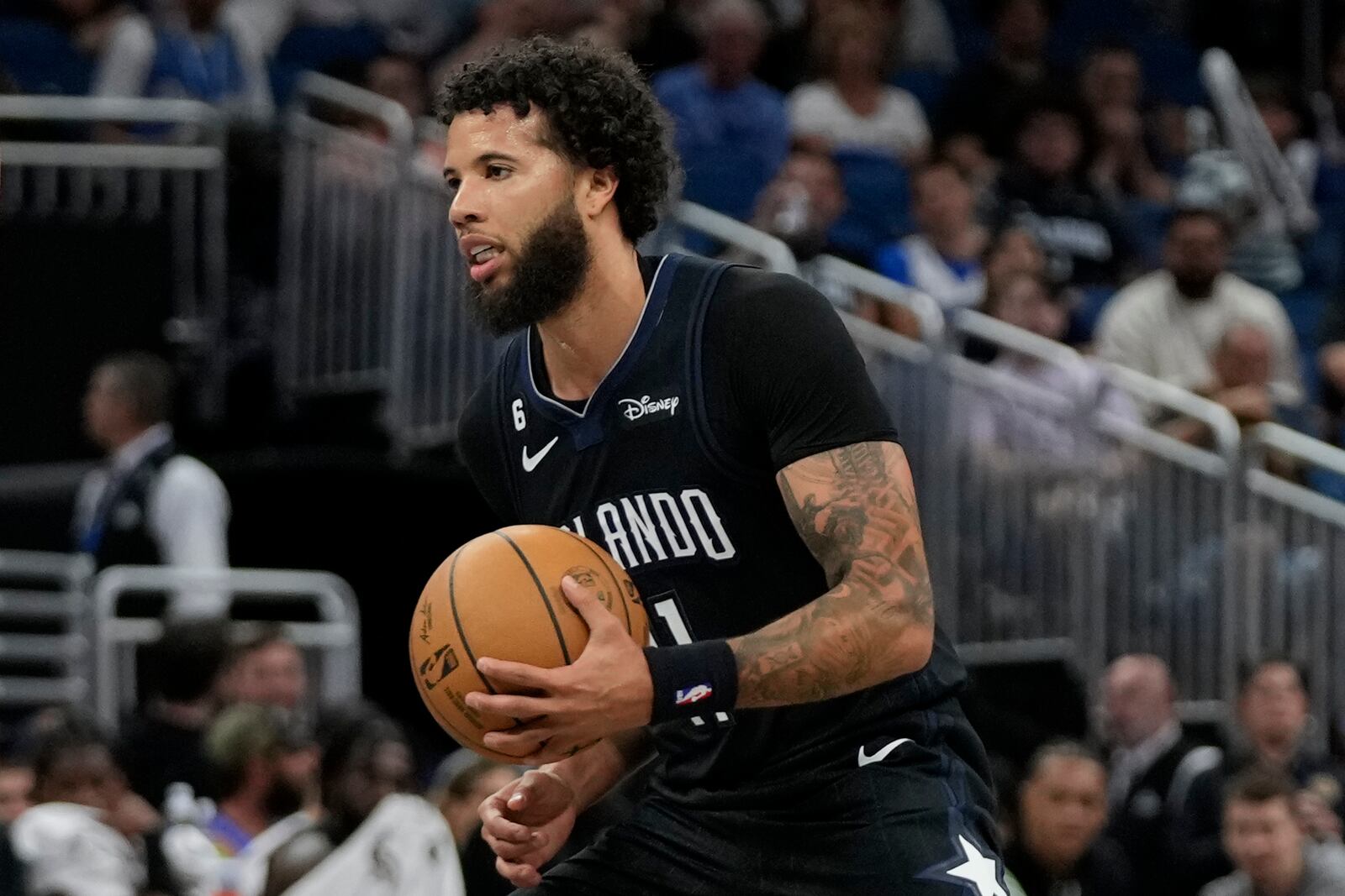 FILE - Orlando Magic's Michael Carter-Williams moves the ball against the Cleveland Cavaliers during the second half of an NBA basketball game, Thursday, April 6, 2023, in Orlando, Fla. (AP Photo/John Raoux, File)