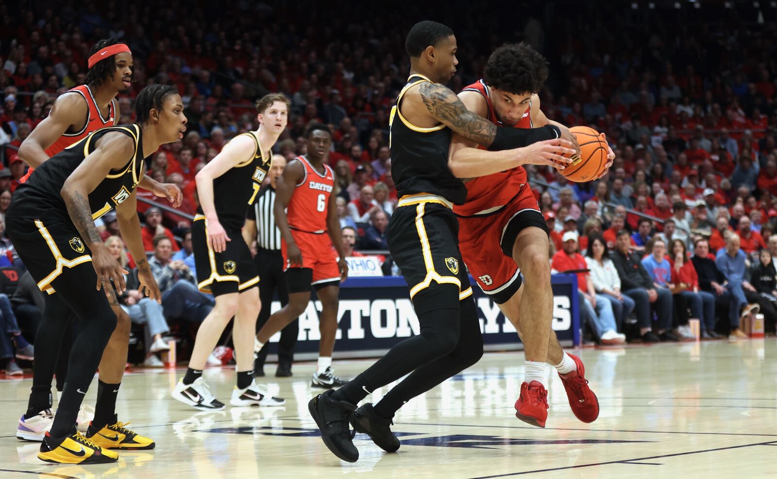 Dayton's Nate Santos looks for a shot against Virginia Commonwealth in the first half on Friday, March 8, 2024, at UD Arena. David Jablonski/Staff