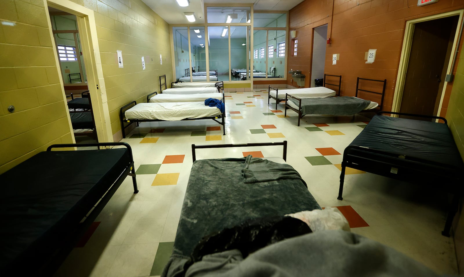 Sleeping areas in the Gettysburg Gateway Shelter for Men in southwest Dayton. The shelter is a former jail complex, and the sleeping areas were previously used as jail pods. MARSHALL GORBY\STAFF