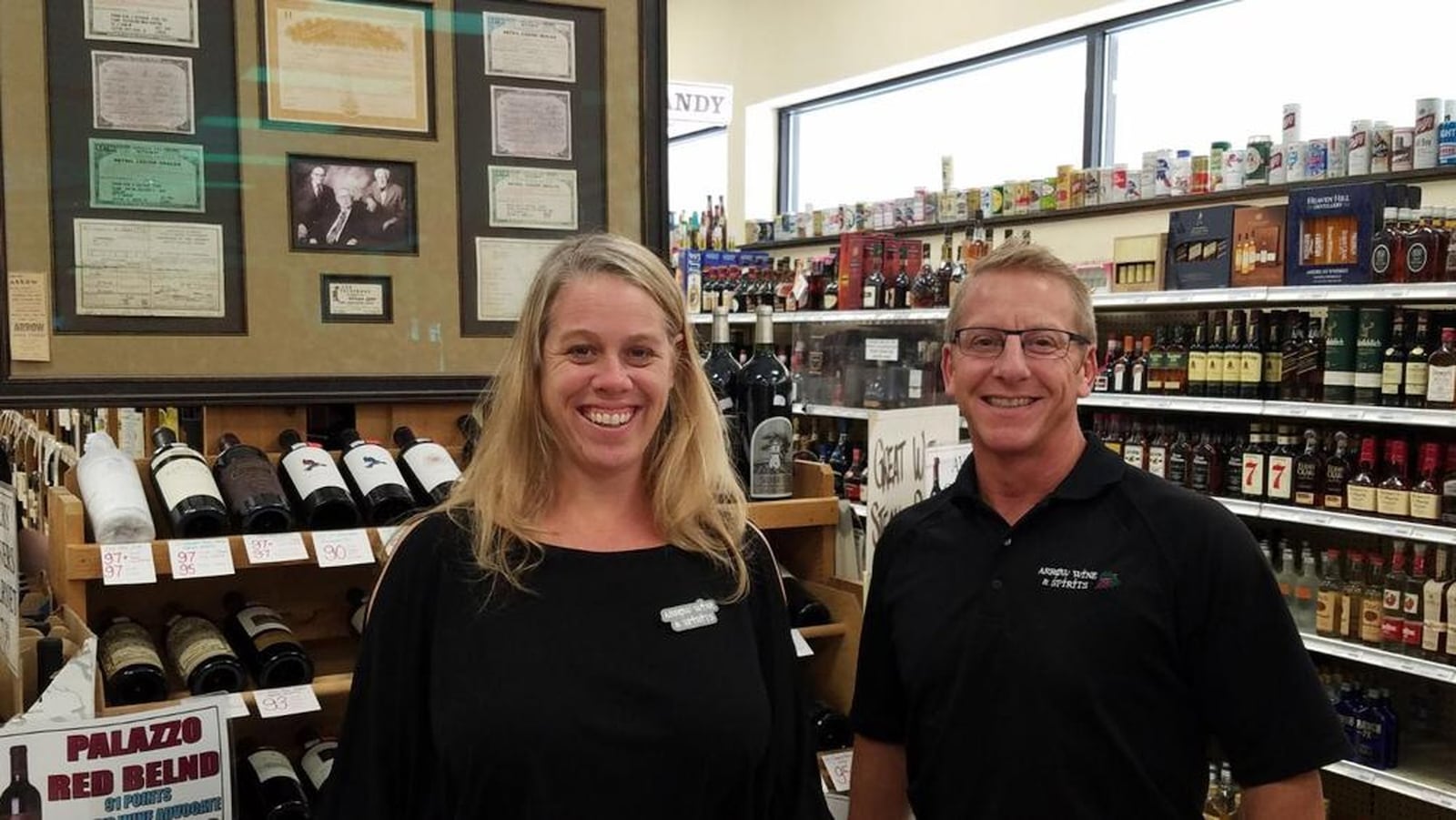 Beth Freyvogel and Mif Frank, third-generation co-owners of Arrow Wine & Spirits. The Arrow Wine restaurant relief program will reward you by making a donation. MARK FISHER/STAFF PHOTO