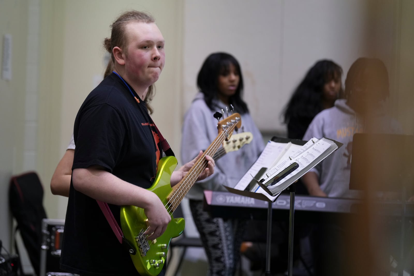 Noah Hand plays the bass during rehearsal at the Stax Music Academy, Thursday, Jan. 30, 2025, in Memphis, Tenn. (AP Photo/George Walker IV)